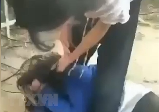 Lam ro vu nu sinh lop 6 bi danh hoi dong o Binh Phuoc hinh anh