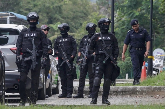 Dac nhiem ao den tinh nhue trong nghi an Kim Jong Nam hinh anh