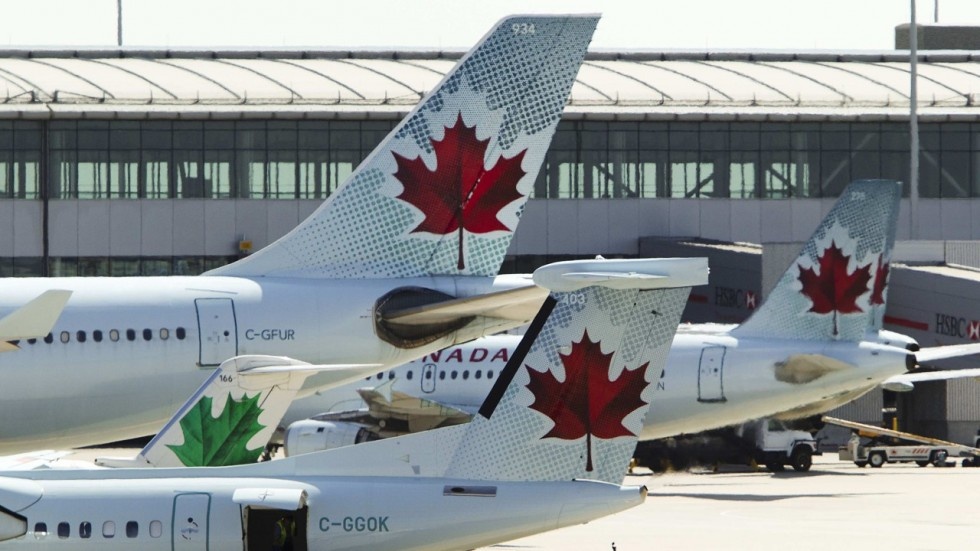 May bay Canada suyt ha canh de len 4 may bay khac hinh anh