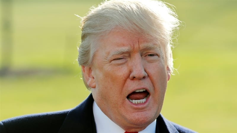 Tong thong Trump doi dau Bo Tu phap anh 1