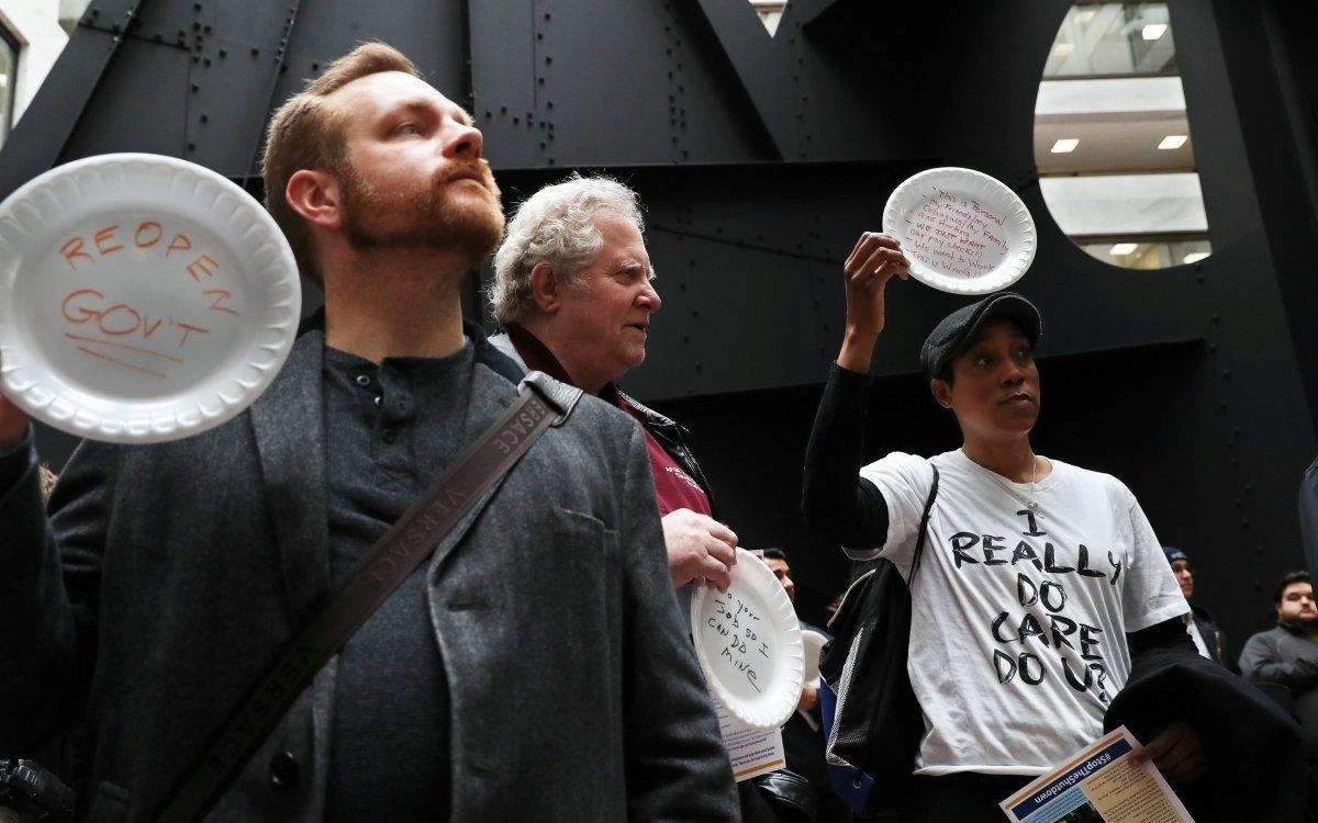 Cong chuc My mon moi doi ngay chinh phu hoat dong tro lai hinh anh