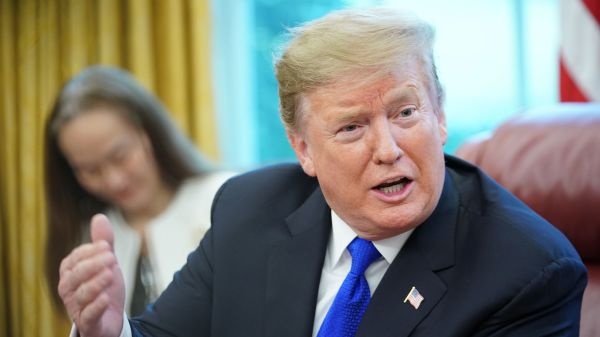 Trump hoan thue hang hoa Trung Quoc anh 1