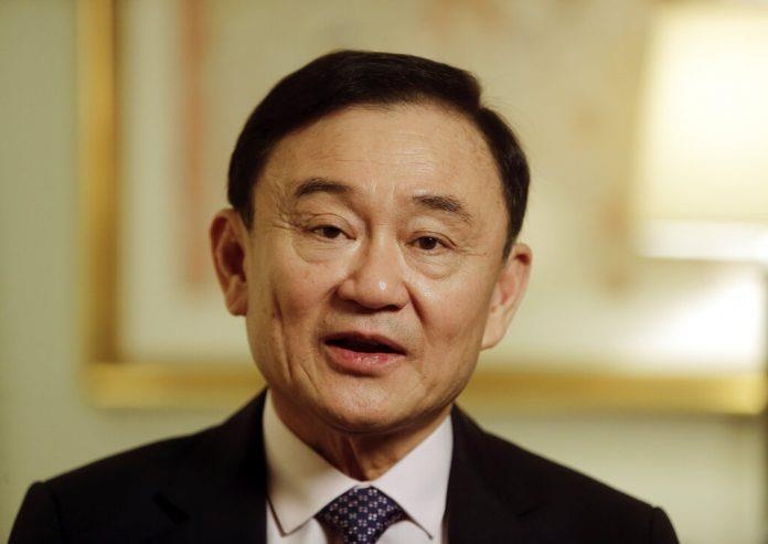 Vua Thai Lan tuoc cap bac ban quan su cua cuu thu tuong Thaksin hinh anh