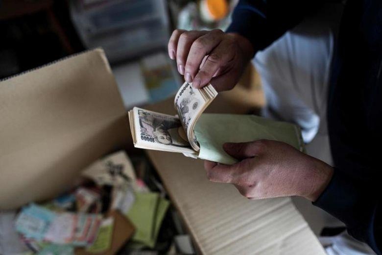 Hon 8 trieu can nha bo trong tai Nhat chua nhieu ngan tien bi mat hinh anh