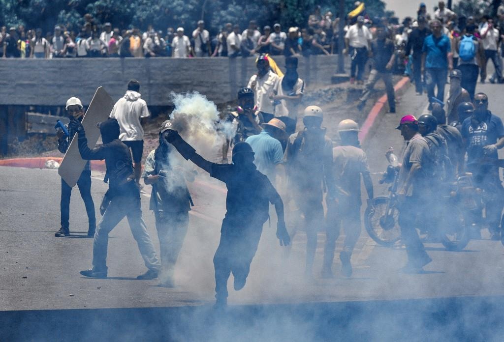 Dao chinh o Venezuela: Cuoc noi day lieu linh cua My va phe doi lap hinh anh