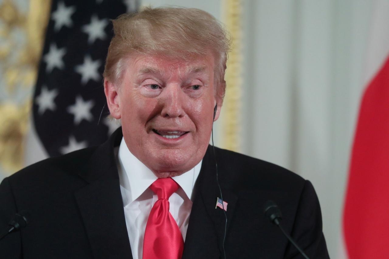 Ong Trump ve phe Kim Jong Un, chi trich cuu pho tong thong IQ thap hinh anh