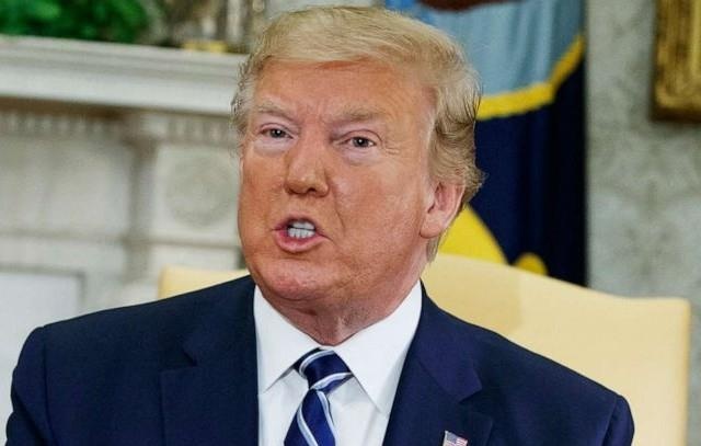 TT Trump noi si quan Iran 'cau tha, ngu ngoc' khi ban ha may bay My hinh anh