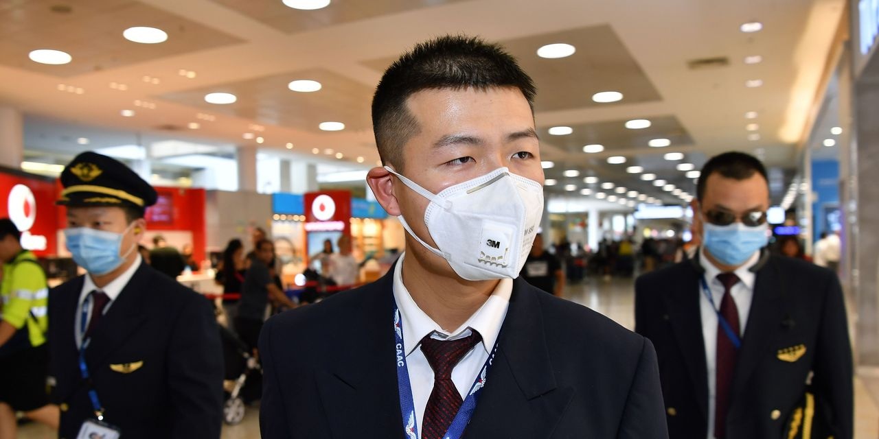 TQ phong toa 3 thanh pho, hon 20 trieu dan bi cach ly vi virus Vu Han hinh anh