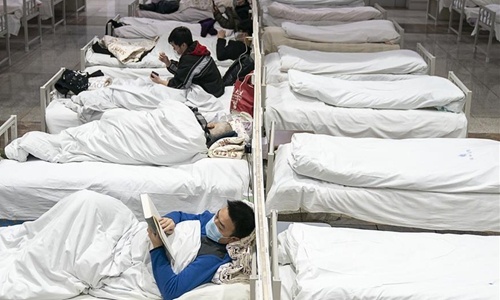 Nhom chuyen gia WHO toi Vu Han tim nguon goc virus corona hinh anh