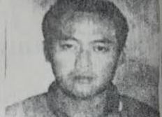 Nguoi dan ong phu quan com bi bat sau 14 nam tron truy na hinh anh