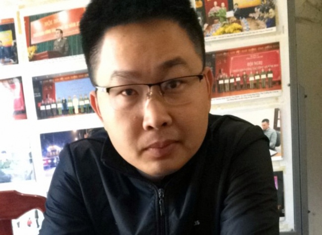 Bat can bo ngan hang lua dao gan 8 ty chuan bi tron sang Trung Quoc hinh anh