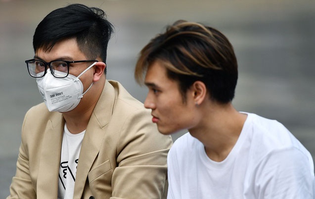 Nguoi dan khong deo khau trang anh 1