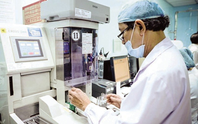 'Giam 1% xet nghiem, tiet kiem 237,5 ty dong' hinh anh