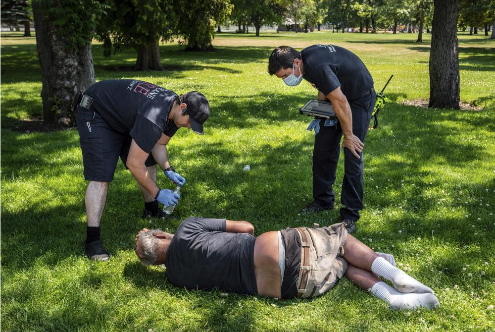 Hang tram nguoi co the da chet do nang nong o My va Canada hinh anh