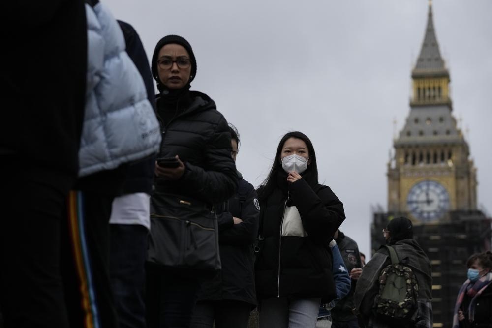 Hai canh tuong trai nguoc o diem nong bien chung Omicron hinh anh