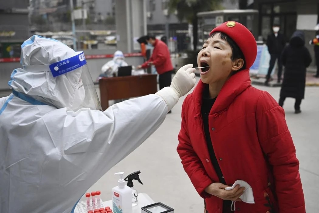 Trung Quoc phat hien cum dich Covid-19 o thanh pho trieu dan hinh anh