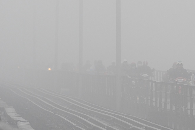 Ha Noi 'chim' trong suong hinh anh
