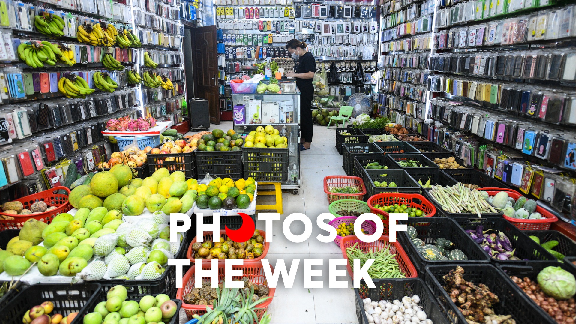 Anh tuan: Tiem dien thoai ban rau cu qua hinh anh