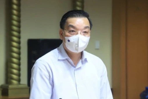 Chu tich Ha Noi yeu cau xu ly nghiem vu nhap canh trai phep hinh anh