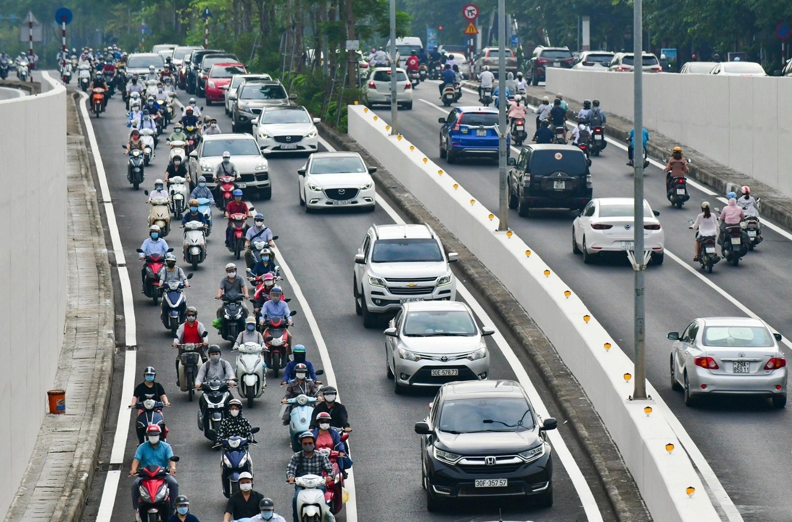 Vi sao Ha Noi muon chon vanh dai 3 lam ranh gioi thu phi oto? hinh anh