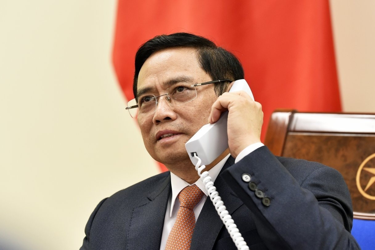 Thu tuong Pham Minh Chinh dien dam voi ong Ly Hien Long hinh anh