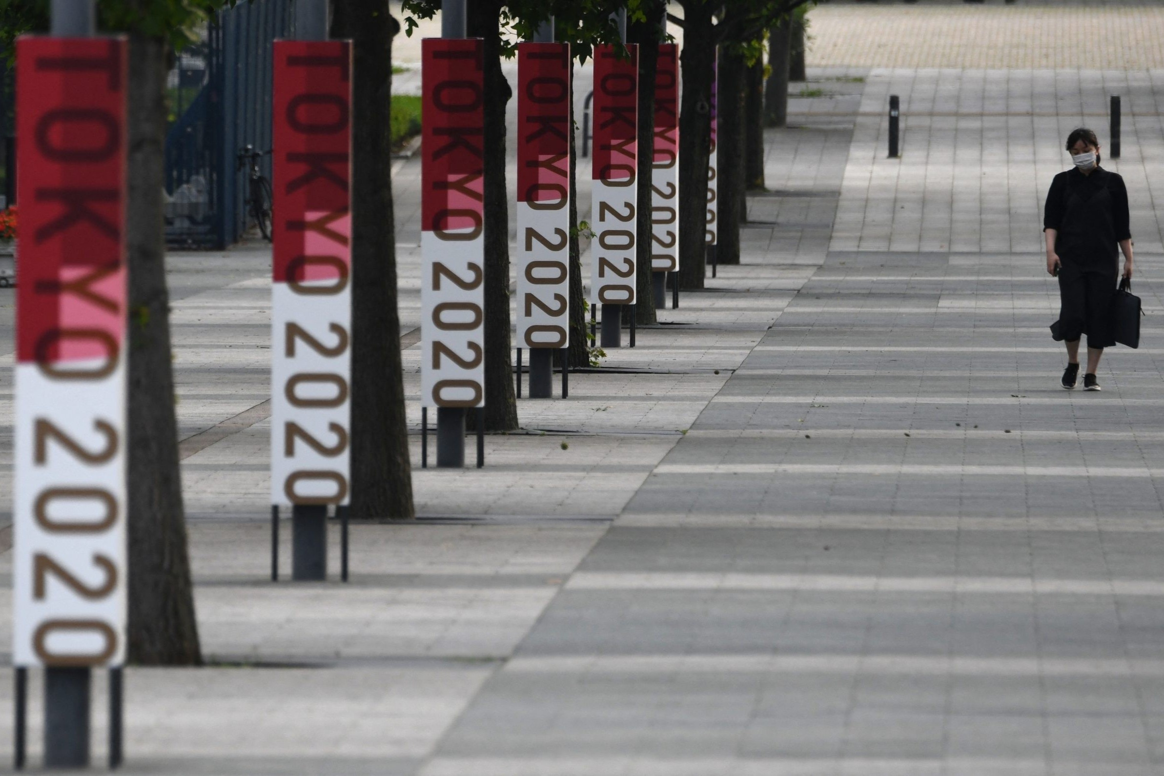 Duong pho Tokyo vang lang, khac xa mot ky Olympic binh thuong hinh anh