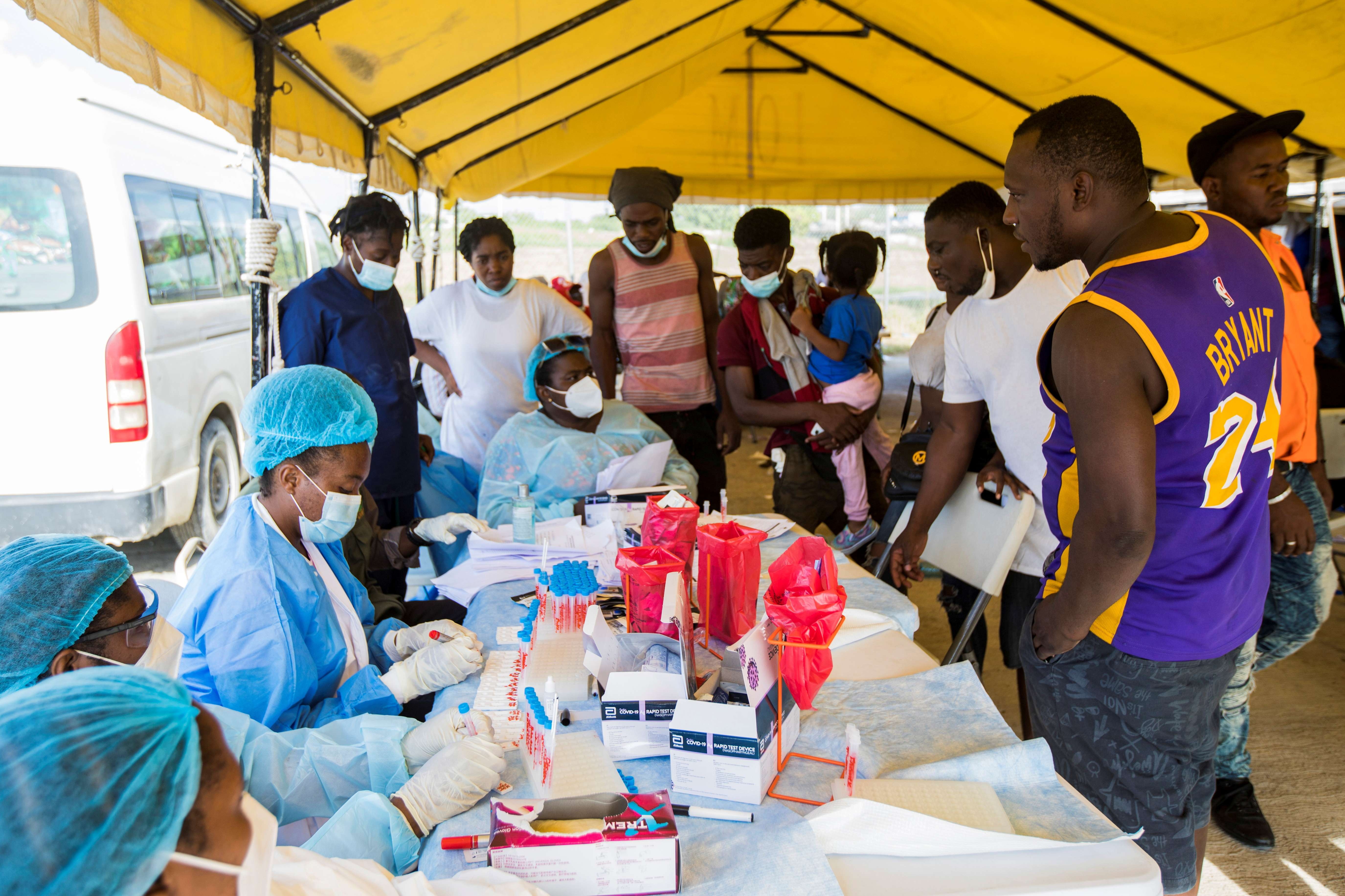 nguoi Haiti bi truc xuat anh 8