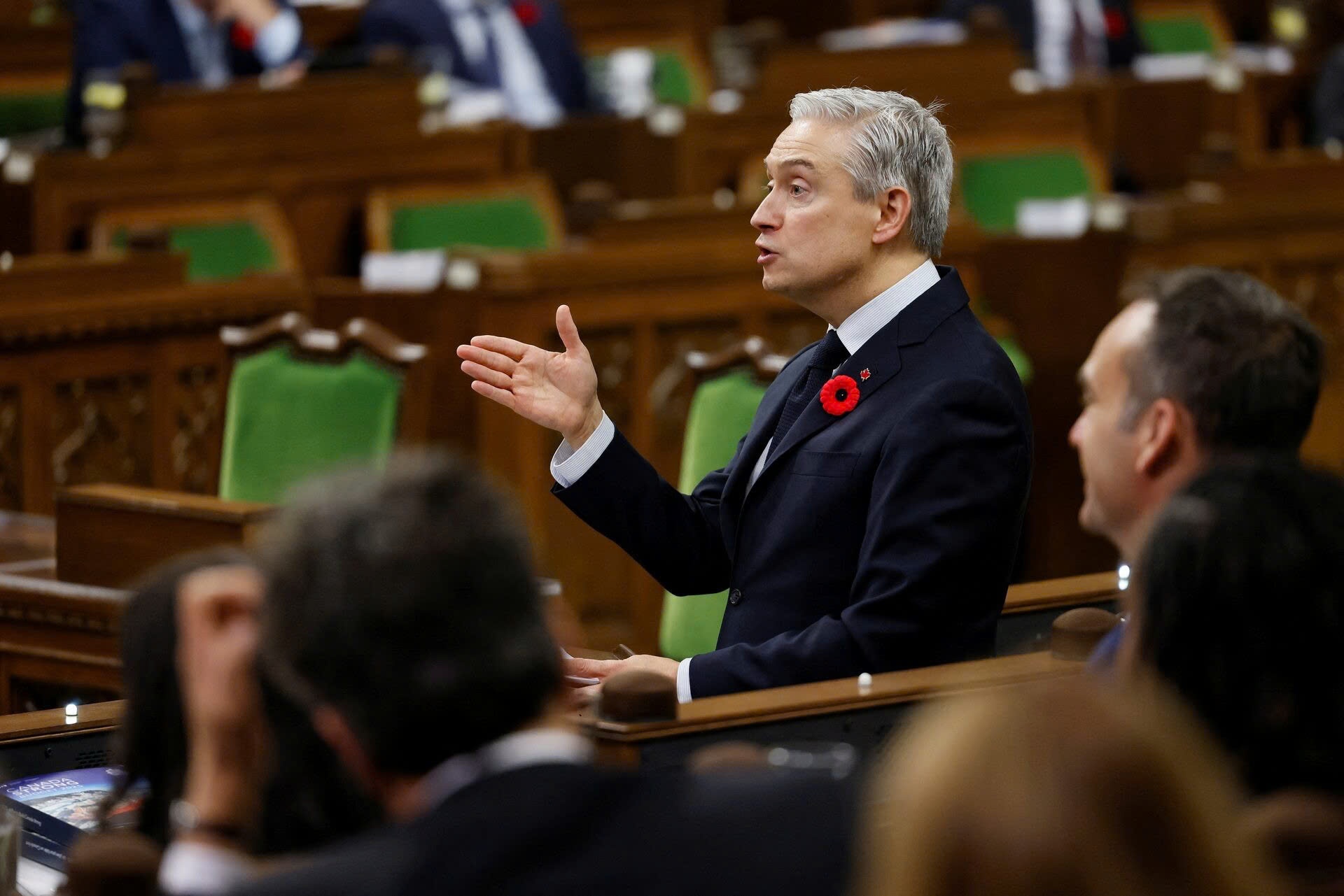 Canada 'tat tay' truoc ap luc thuong mai tu My hinh anh