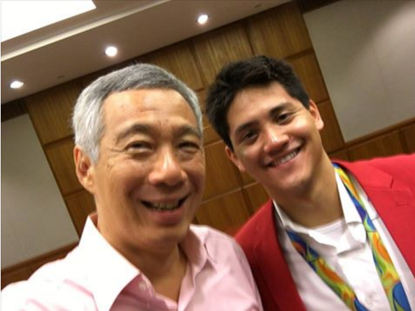 Thu tuong Singapore moi Schooling chup anh chung hinh anh