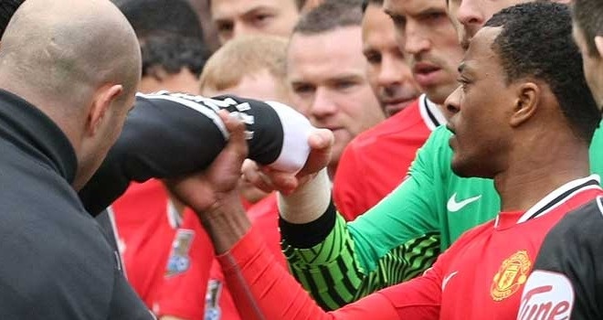 Suarez va Patrice Evra anh 2