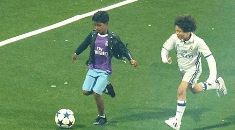 Con trai Ronaldo cat toc hui cua anh 5