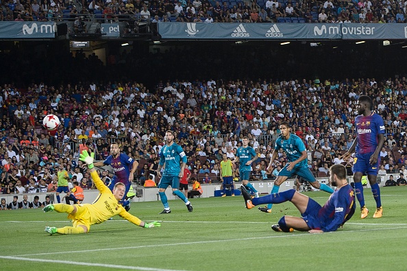 Pique bi CDV Real treu choc anh 1