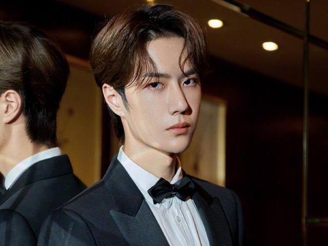 Vuong Nhat Bac va dan nam than Hoa ngu banh bao hon nho mac vest hinh anh