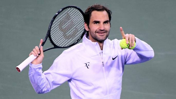 Cau do bong tennis mau vang hay xanh lam kho Roger Federer hinh anh