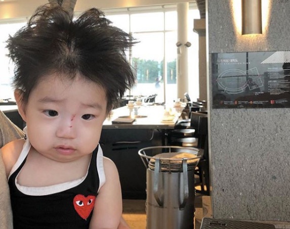 cau be voi mai toc mat troi anh 1