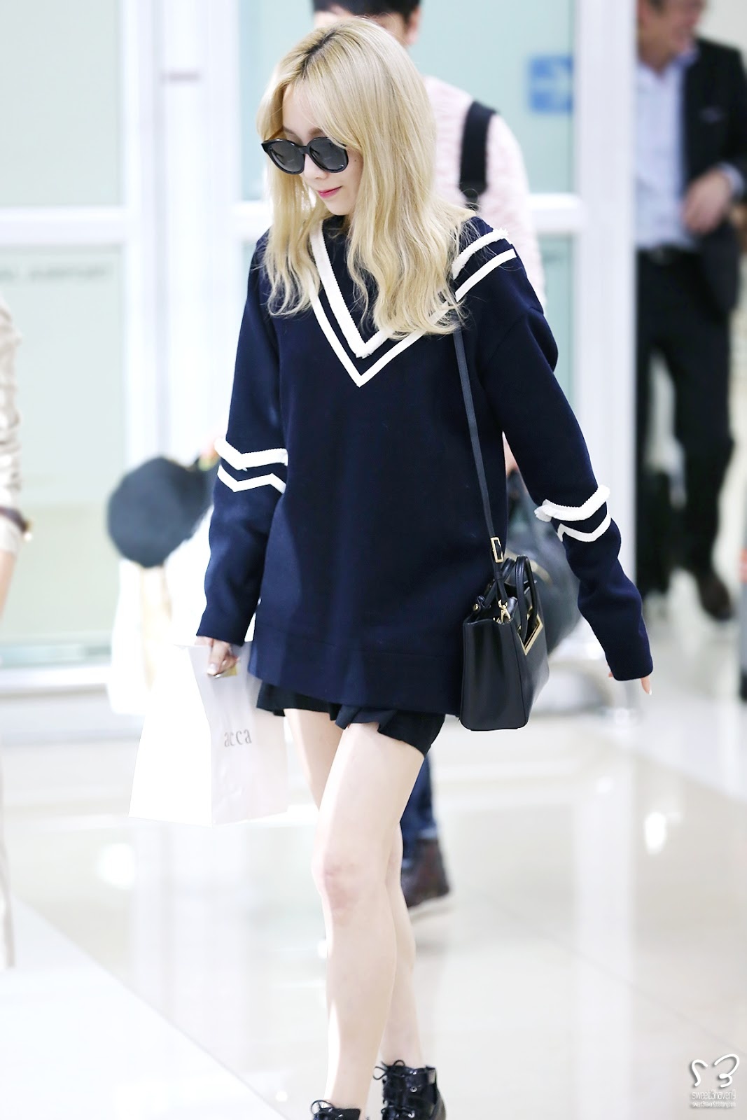 Taeyeon o san bay anh 4