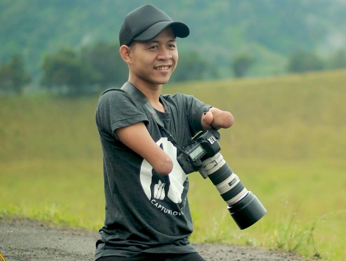Tu chang trai khong tay chan den nhiep anh gia chuyen nghiep hinh anh