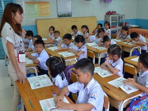 Tien dau mien hoc phi, tang luong giao vien? hinh anh