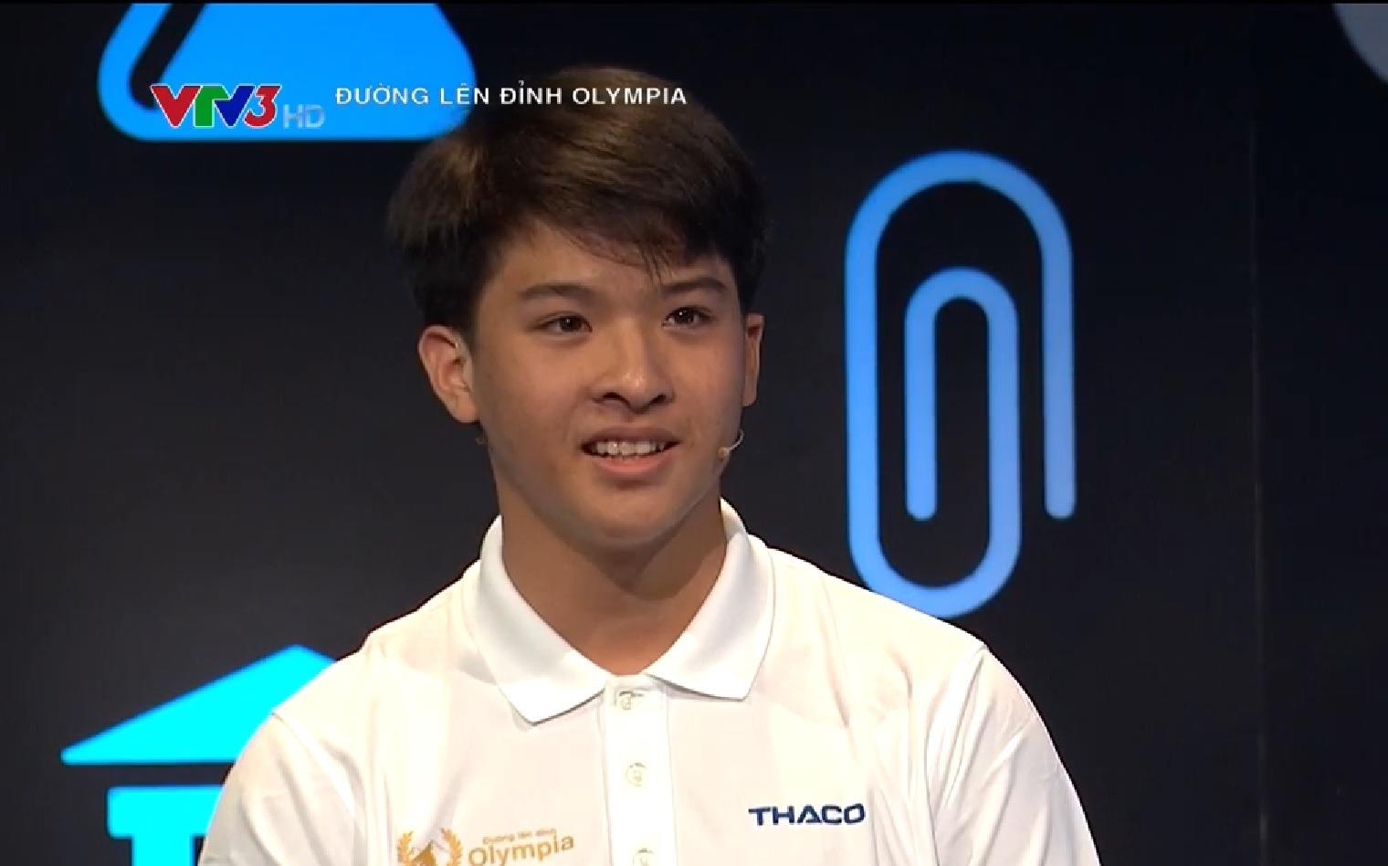 'Hot boy Olympia' xoay rubik chi trong 13 giay hinh anh