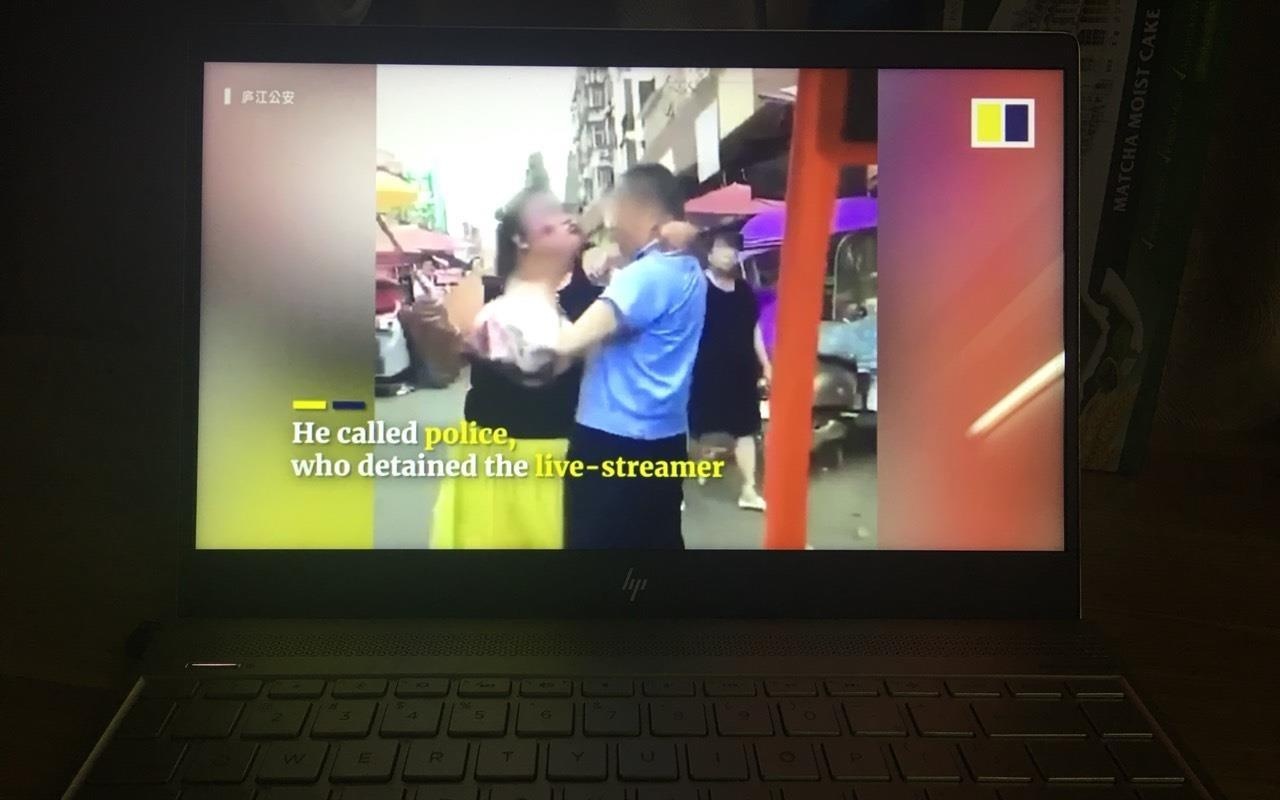 Nu streamer Trung Quoc bi canh sat bat vi cuong hon ong lao giua duong hinh anh