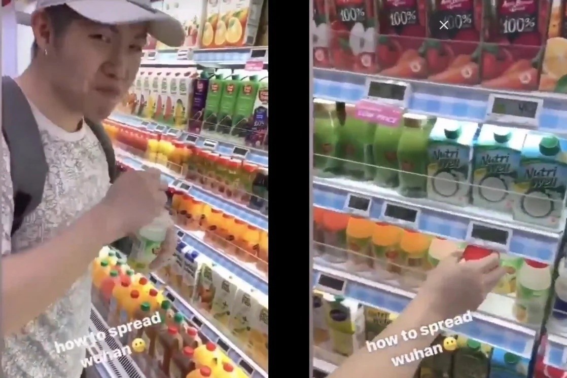 Hai nguoi uong trom nuoc trong sieu thi, doa 'lan truyen virus Vu Han' hinh anh