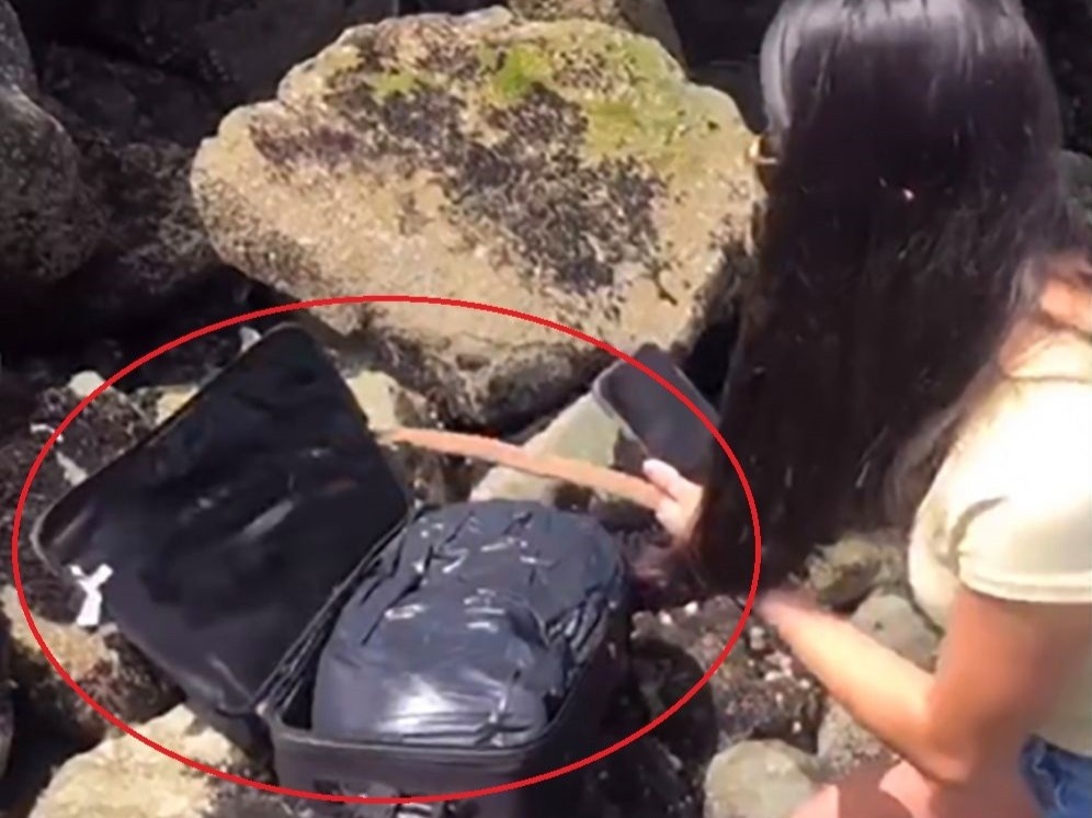 Phat hien vali chua thi the trong khi quay video o My hinh anh