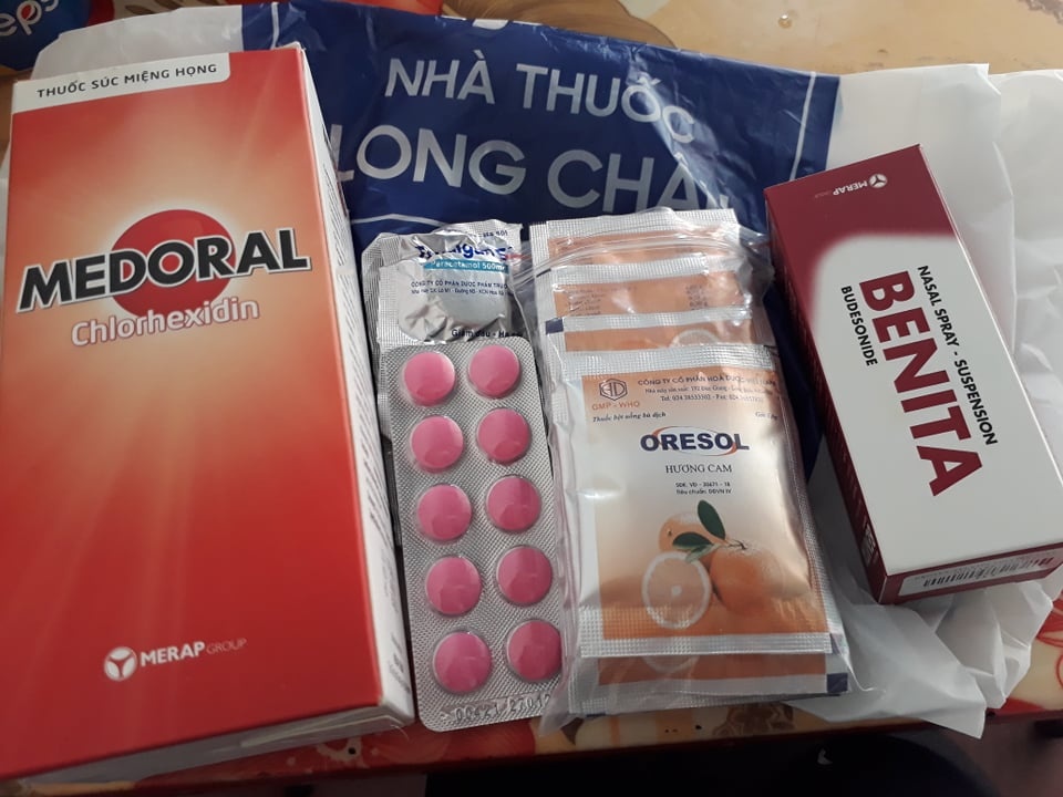 cha me mac Covid-19 anh 2