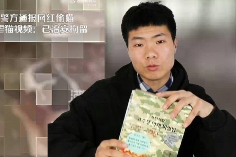 Vlogger Trung Quoc bi bat vi dang clip tra tan meo hinh anh