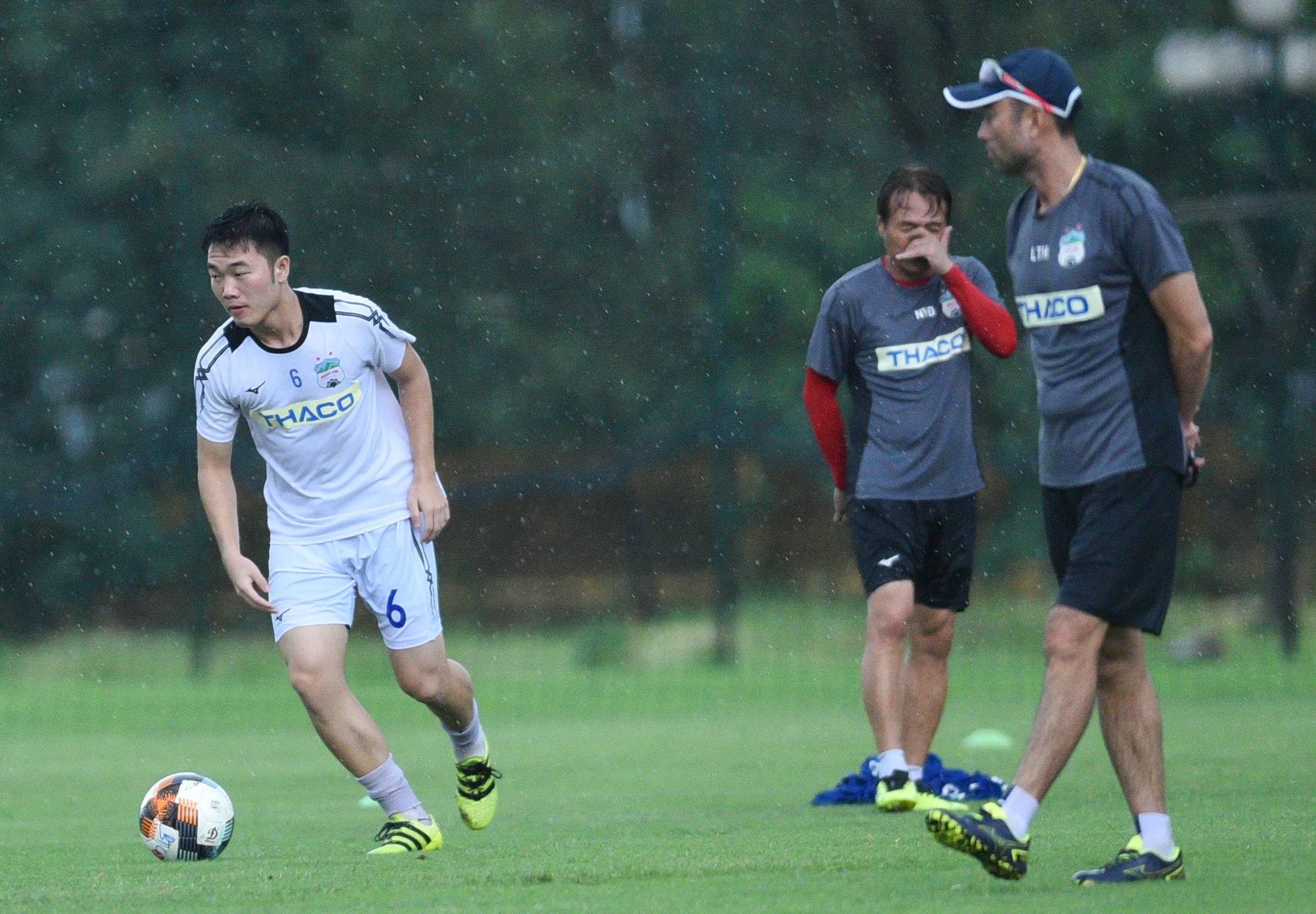 Xuan Truong,  HAGL vs Ha Noi,  Chu Dinh Nghiem anh 1