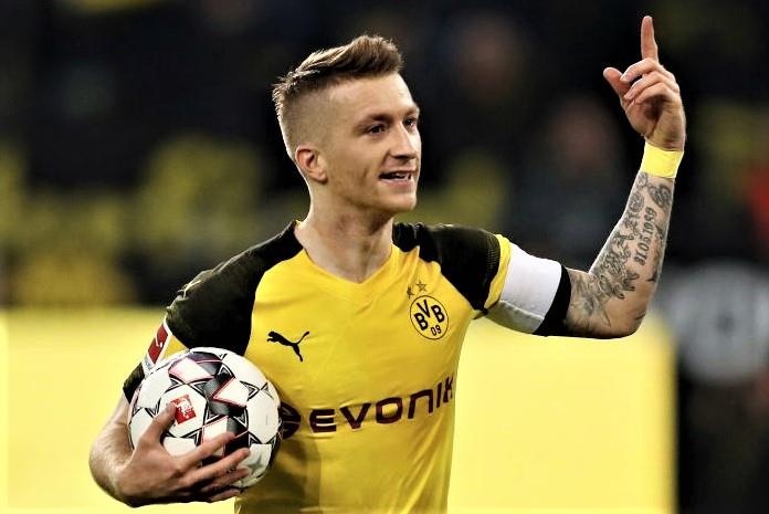 Dortmund vuon len dau bang Bundesliga sau tran thang Augsburg hinh anh