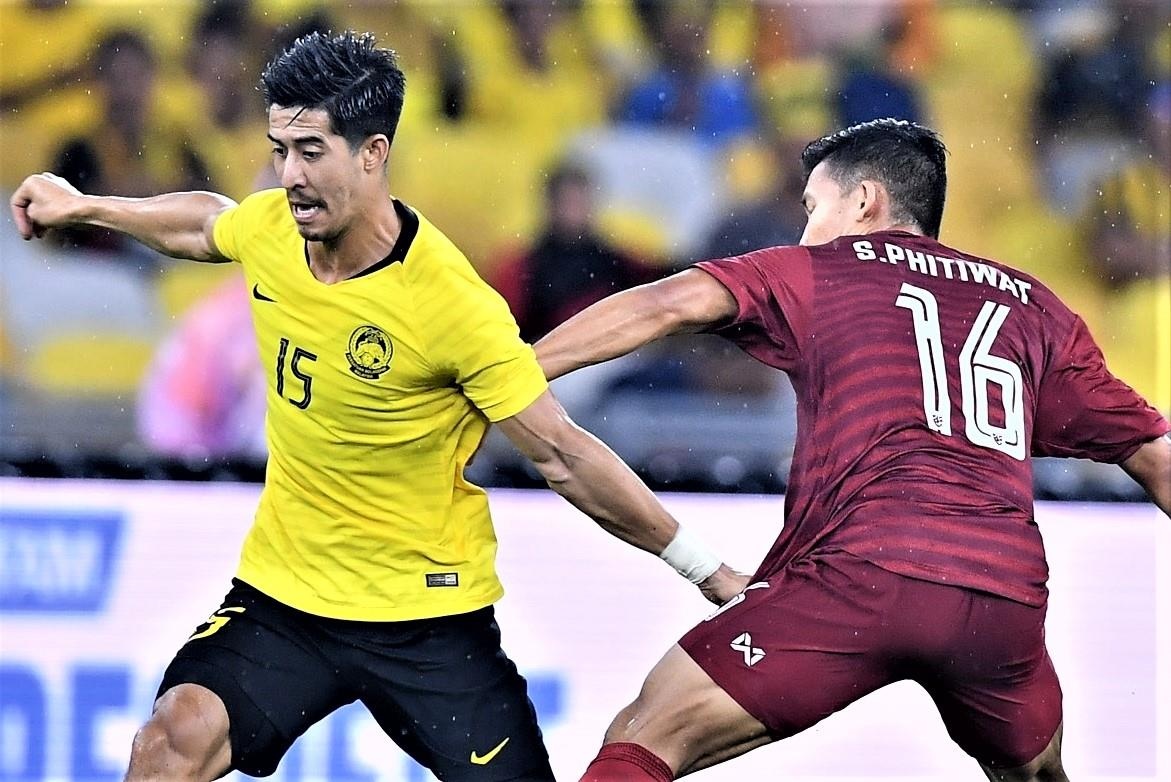 Highlights vong loai World Cup 2022: Malaysia 2-1 Thai Lan hinh anh