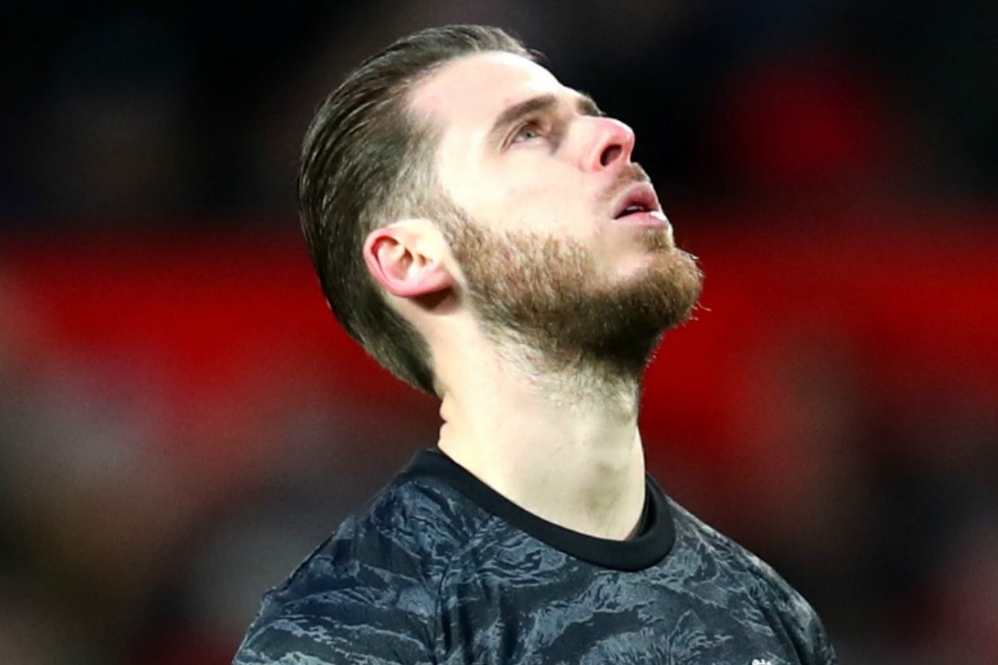 Neville: 'De Gea dang khien Man Utd tra gia' hinh anh