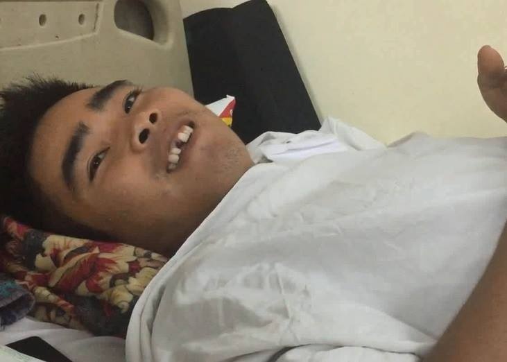 Chang trai bi liet nua nguoi: Mong binh phuc de bot ganh nang cho me hinh anh