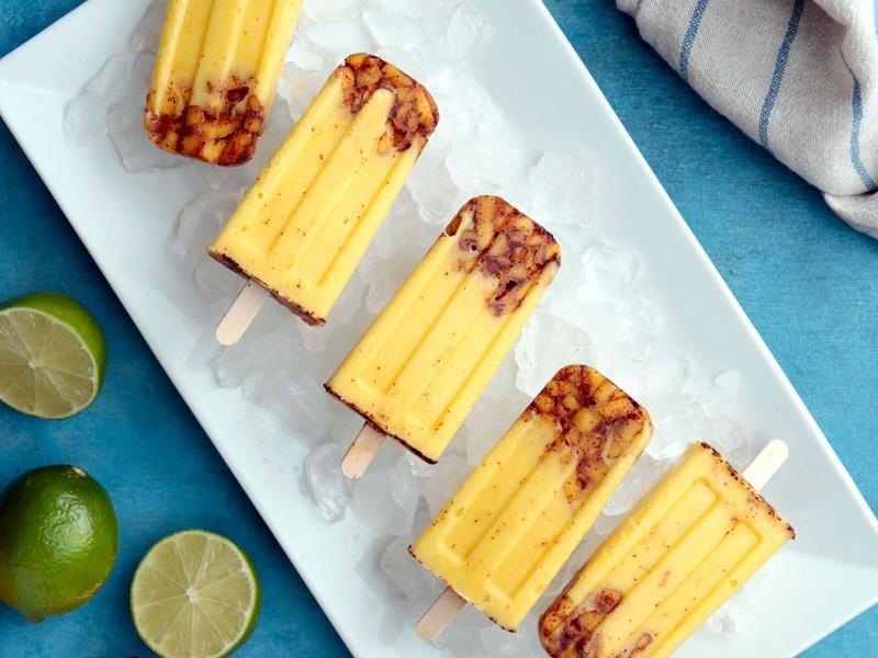 Bien tau kem xoai cay la mieng nham nhi ngay mua gio hinh anh